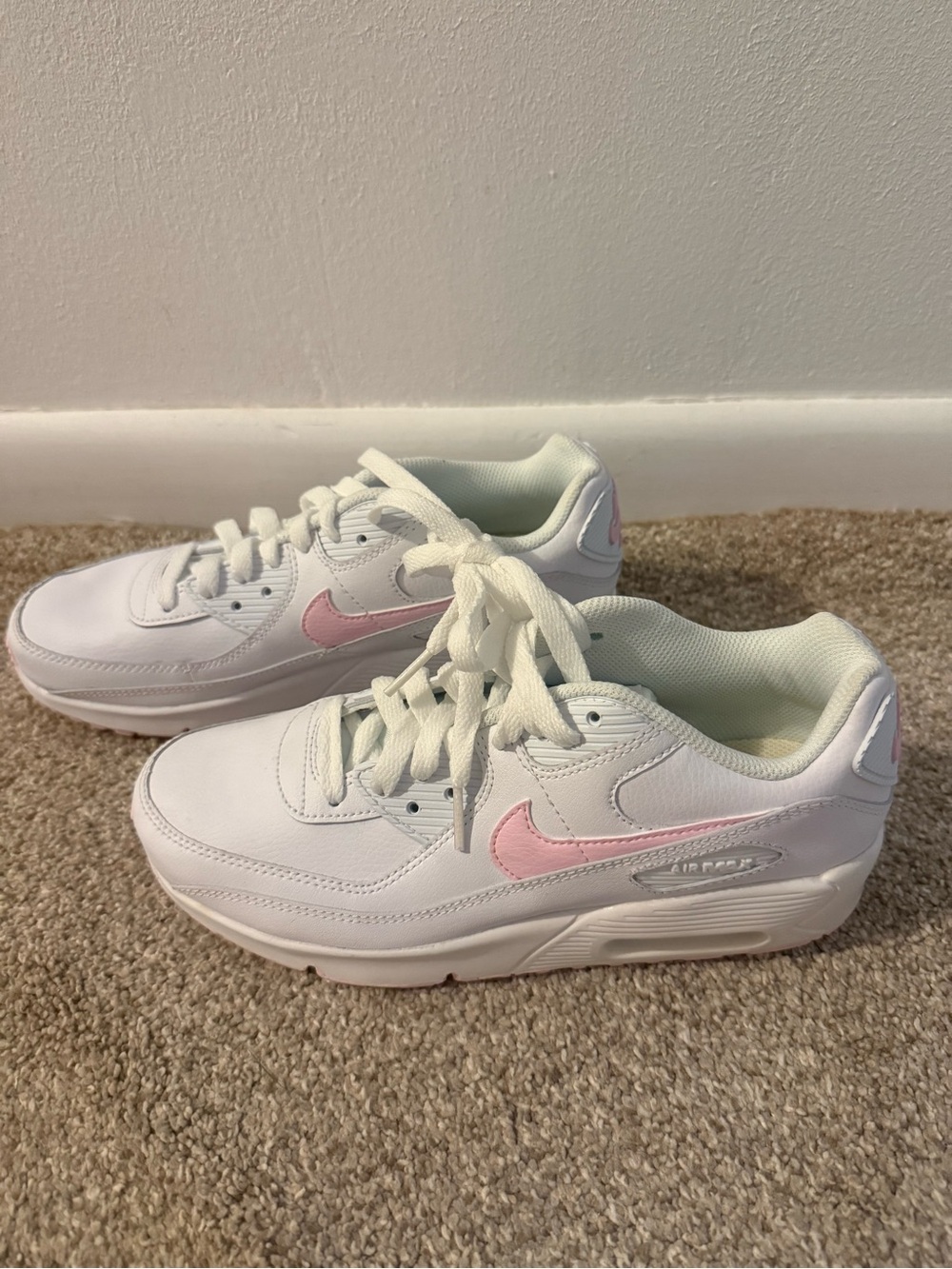 Nike Kids White Sneakers with Pink Swoosh Accent